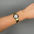 Case Gold Plated Stainless Steel Dial White Dial Black Roman Half Bangle