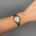 Case Gold Plated Stainless Steel Dial White Dial Black Roman Half Bangle