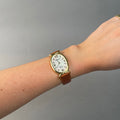 Case Gold Plated Stainless Steel Dial Mother of Pearl Dial Champagne Arabic Leather